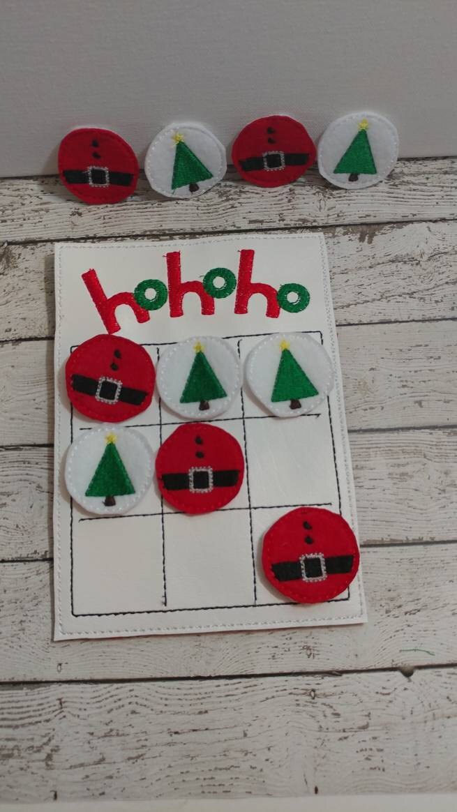 Handcrafted Christmas tic tac toe game for boys and girls. Can be used as a gift or party favor.