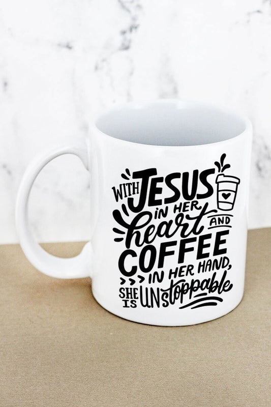 With Jesus in her heart and coffee in her hand she is unstoppable - Coffee Mug