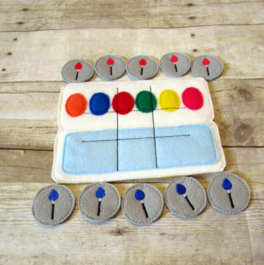 Handcrafted paint palette theme tic tac toe game for the artist boy and girl or girl in your life. Can be used as a gift or party favor.
