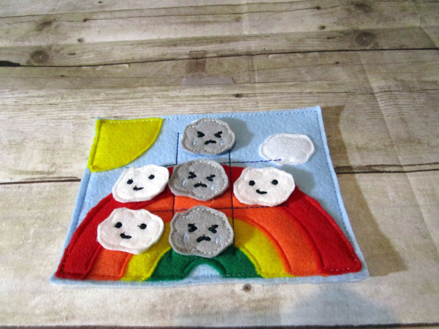 Handcrafted rainbow theme tic tac toe game for boys and girls. Can be used as a gift or party favor.
